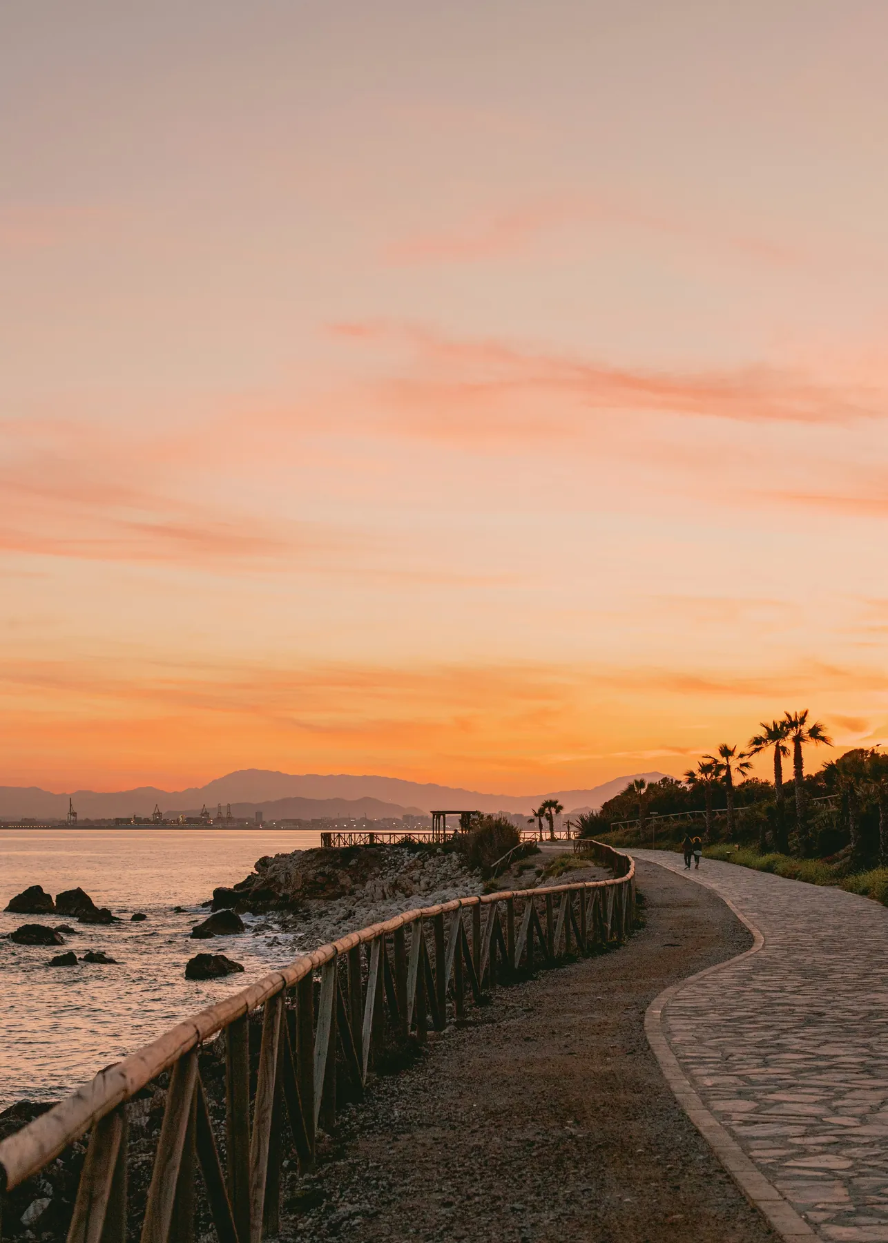 Sunset on Malaga's eastern coastal promenade
