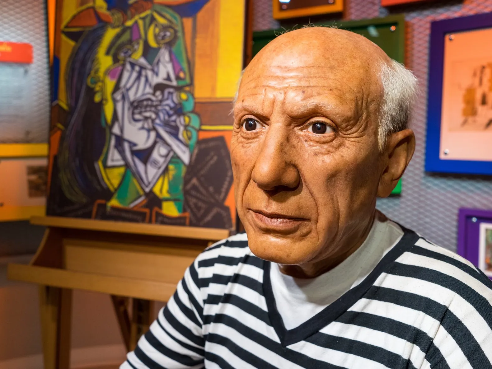 Portrait of Pablo Picasso surrounded by his art